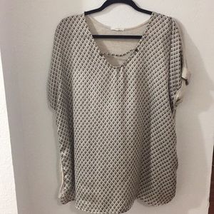 Cream blouse with neck detail and cuffed sleeves